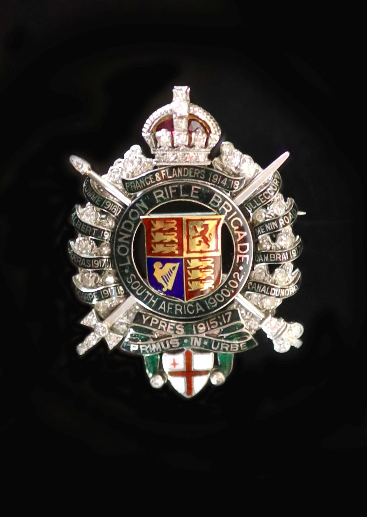 A white and yellow gold, diamond and polychrome enamel set London Rifle Brigade Sweetheart’s brooch